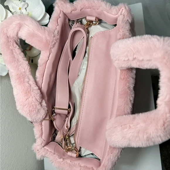 Juicy Couture Let’s Get Cozy Tote in Blush Pink.